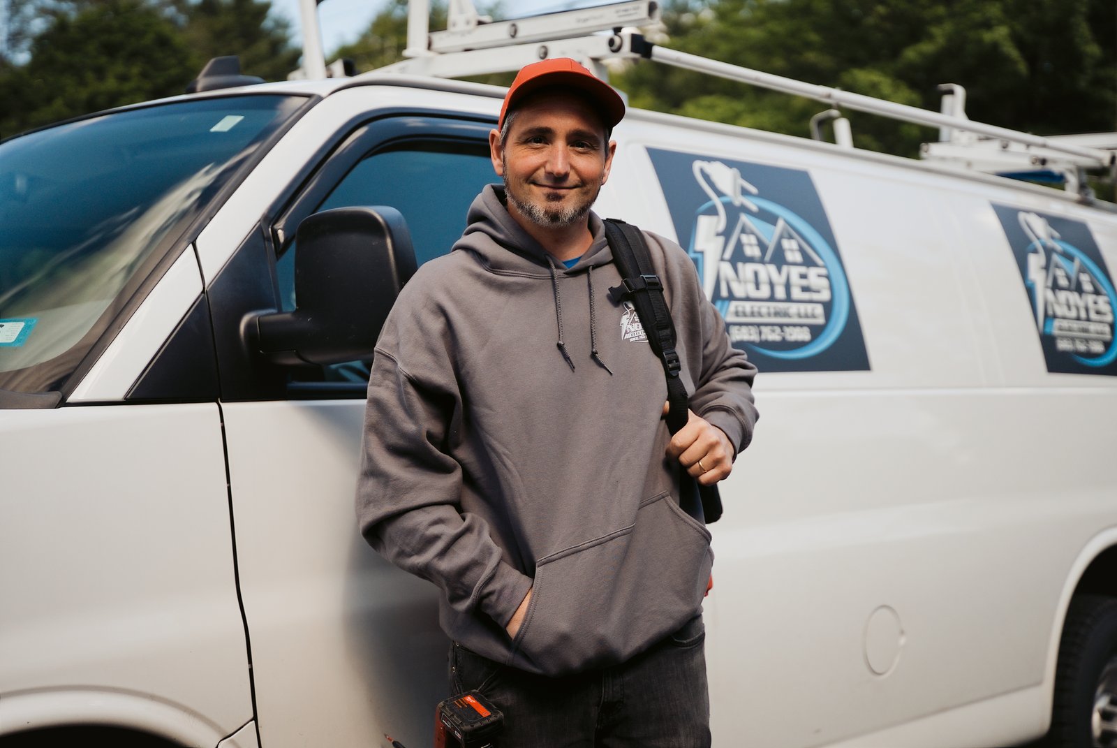 John Noyes, licensed master electrician, with the Noyes Electric van